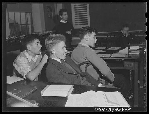 Washington, D.C. Listening to an explanation by the teacher in physics class at Woodrow Wilson High School