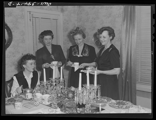 Washington, D.C. Members of a Wilson High School sorority serving tea for their mothers at the home of their advisor, Mrs. Mary Spangler (right)