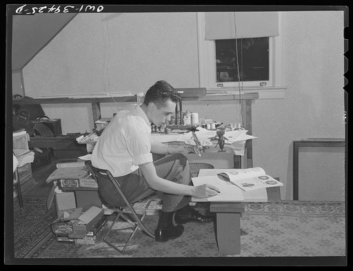Washington, D.C. Walter Spangenberg, a student at Woodrow Wilson High School, has fitted up a workshop in the attic of his home where he builds model airplanes, ships and trains