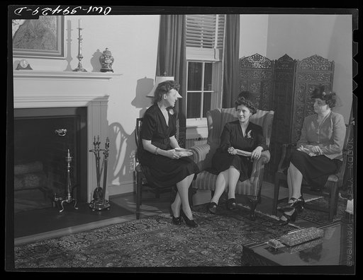 Washington, D.C. Members of a Woodrow Wilson High School sorority serving tea for their mothers at the home of their advisor, Mrs. Mary Spangler (left)