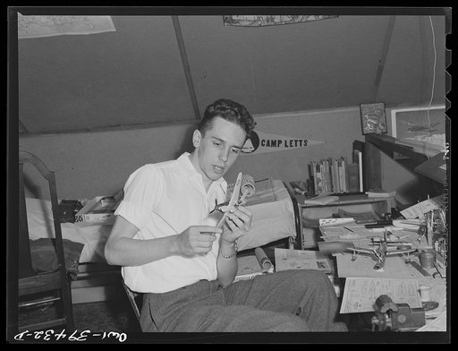 Untitled photo, possibly related to: Washington, D.C. Walter Spangenberg, a student at Woodrow Wilson High School, has fitted up a workshop in the attic of his home where he builds model airplanes, ships, and trains