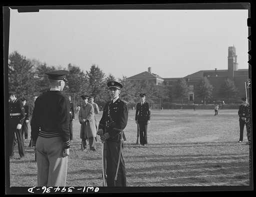 Untitled photo, possibly related to: Washington, D.C. Walter Spangenberg, a captain in the cadets at Woodrow Wilson High School, drilling his company