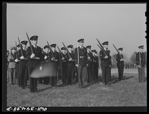 Untitled photo, possibly related to: Washington, D.C. Walter Spangenberg, a captain in the cadets at Woodrow Wilson High School, drilling his company