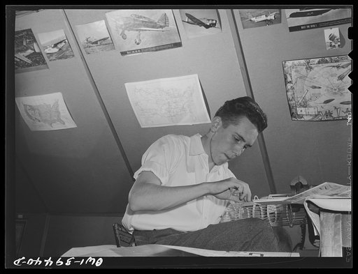 Washington, D.C. Walter Spangenberg, a student at Woodrow Wilson High School, has fitted up a workshop in the attic of his home where he builds model airplanes, ships, and trains