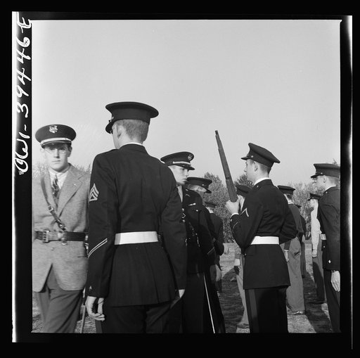 Untitled photo, possibly related to: Washington, D.C. Walter Spangenberg, a captain in the cadet corps at Woodrow Wilson High School, drilling his company