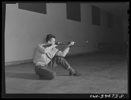 Washington, D.C. Walter Spangenberg practicing with a rifle at Woodrow Wilson High School