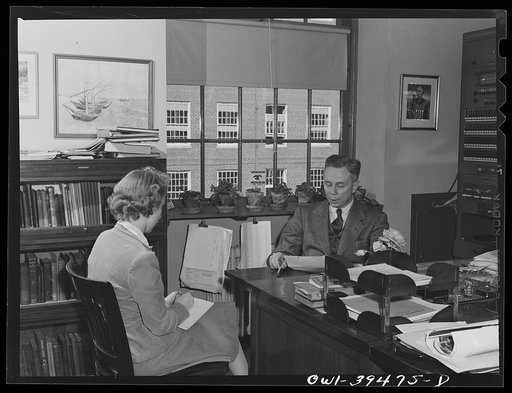 Washington, D.C. Norman J. Nelson, principal of Woodrow Wilson High School, in his office