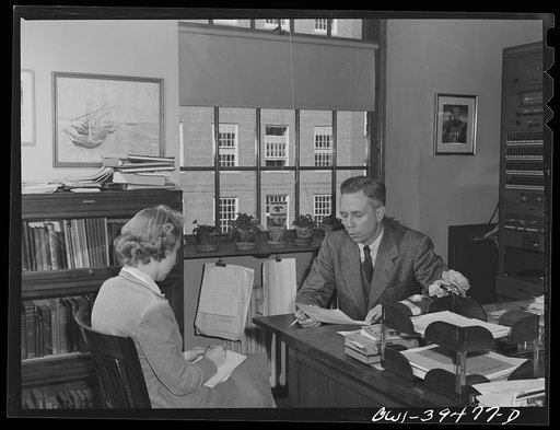 Washington, D.C. Norman J. Nelson, principal of Woodrow Wilson High School, in his office