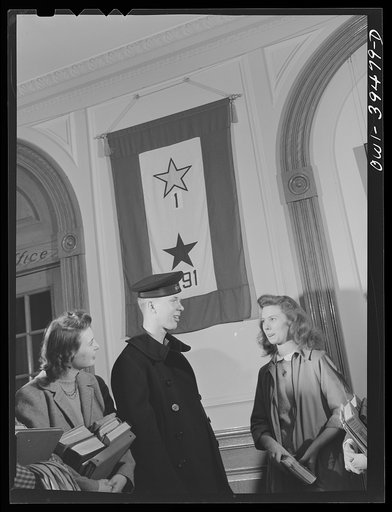 Washington, D.C. A former student talking to friends in the front hall at Woodrow Wilson High School