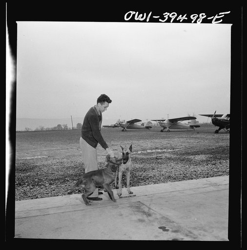 Frederick, Maryland. Walter Spangenberg, a student at Woodrow Wilson High School, and two of the mascots at the airfield where he takes flying lessons