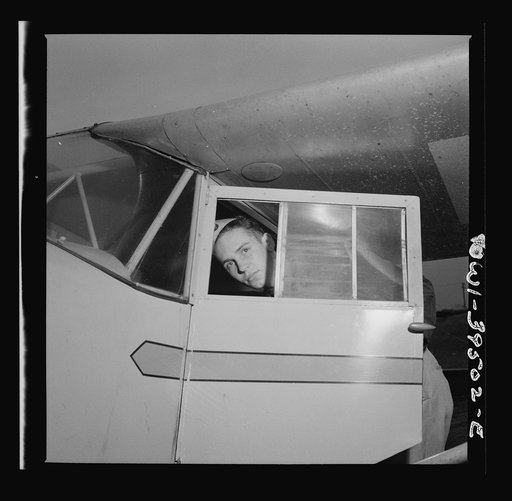 Untitled photo, possibly related to: Frederick, Maryland. Walter Spangenberg, a student at Woodrow Wilson High School, in the plane in which he first soloed at the Stevens Airport