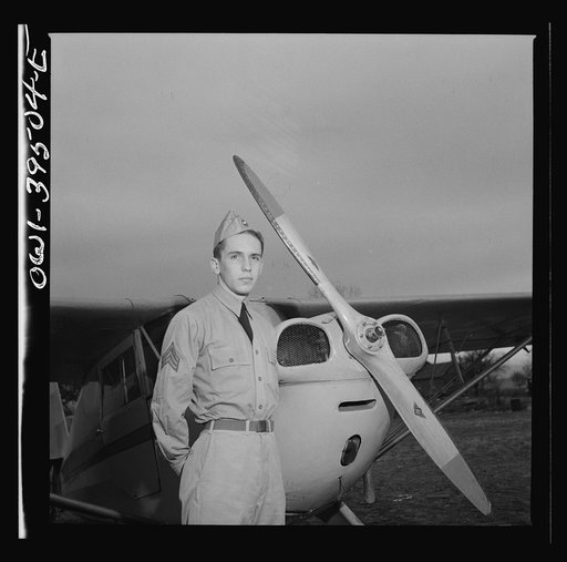 Frederick, Maryland. Walter Spangenberg, a student at Woodrow Wilson High School, in his Civil Air Patrol uniform at the Stevens Airport where he takes flying lessons