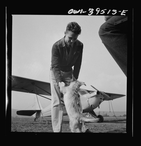 Frederick, Maryland. Walter Spangenberg, a student at Woodrow Wilson High School, and "Greaseball," a mascot at the Stevens Airfield