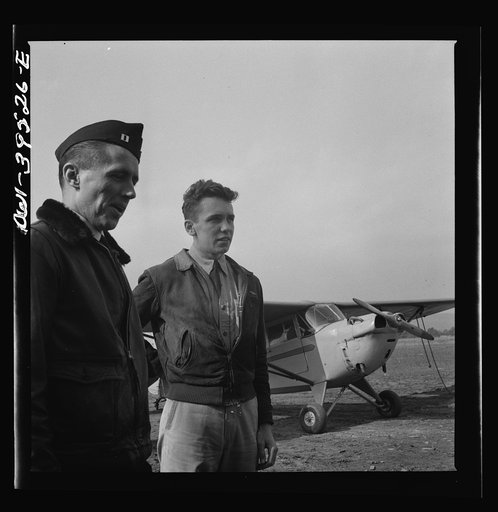 Frederick, Maryland. Walter Spangenberg, a student at Woodrow Wilson High School, and a friend at the Stevens Airport