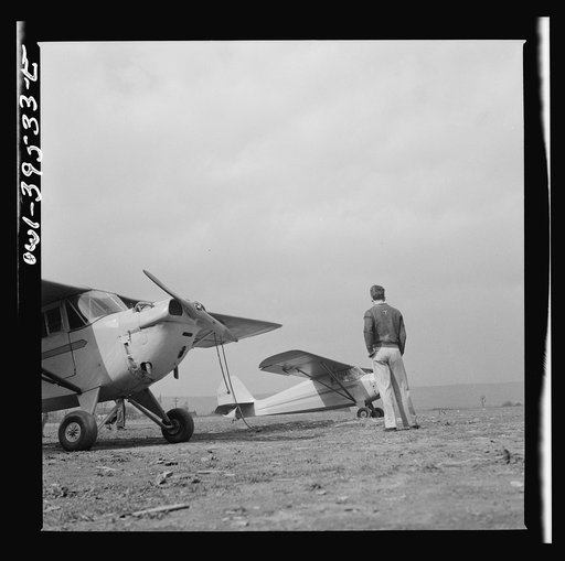 Untitled photo, possibly related to: Frederick, Maryland. Walter Spangenberg, a student at Woodrow Wilson High School, at the Stevens Airport