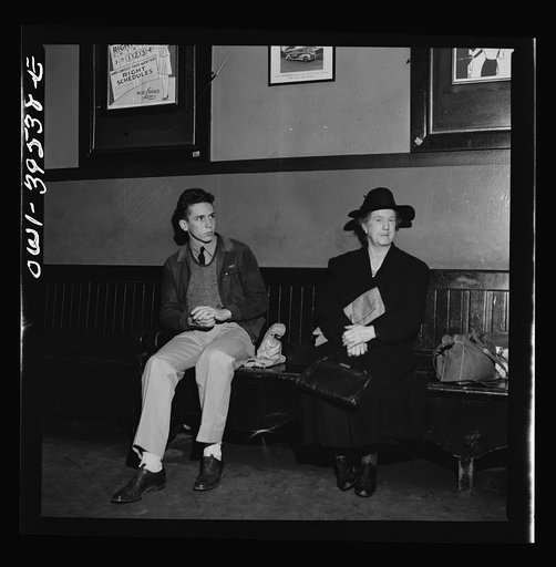 Washington, D.C. Walter Spangenberg, a student at Woodrow Wilson High School, waiting at the bus station for transportation to the Stevens Airport, Frederick, Maryland