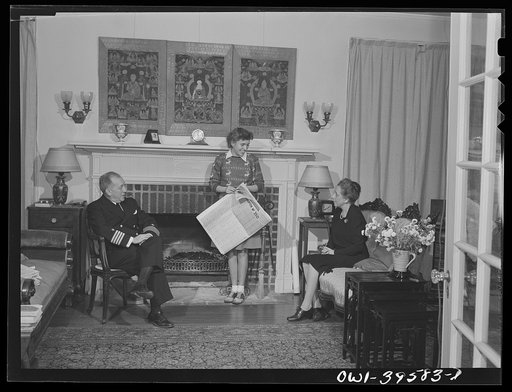 Washington, D.C. Sally Dessez, a student at Woodrow Wilson High School, with her father and aunt in the living room of their home