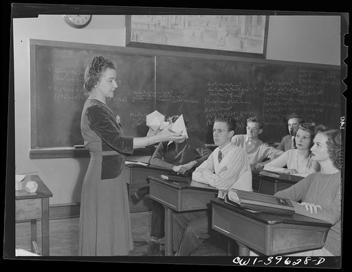 Washington, D.C. A geometry teachers at Woodrow Wilson High School using a model to explain a figure