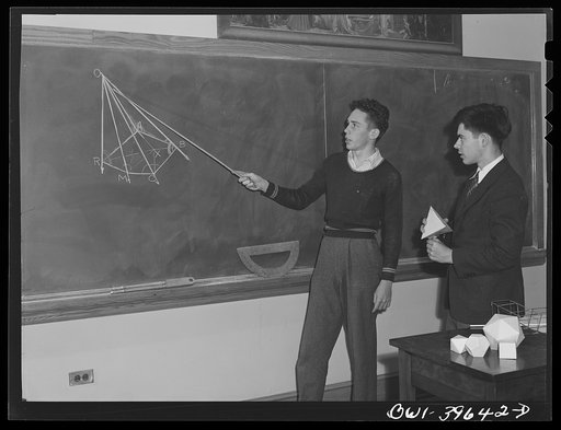 Washington, D.C. Walter Spangenberg (holding the pointer) giving a demonstration in geometry class at Woodrow Wilson High School