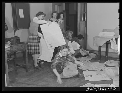Washington, D.C. Sally Dessez, a member of the Woodrow Wilson High School newspaper staff helping fold papers for distribution
