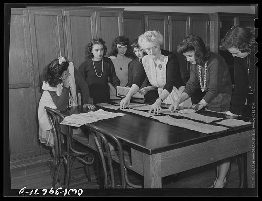 Washington, D.C. Learning to cut from a pattern in a sewing class at Woodrow Wilson High School