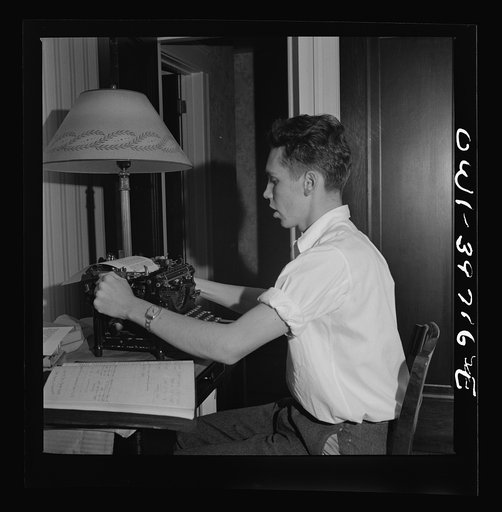 Washington, D.C. Walter Spangenberg, a student at Woodrow Wilson High School, doing his school work at home