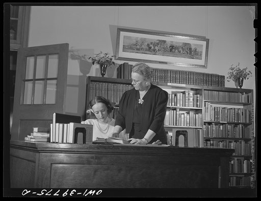 Washington, D.C. The school librarian and one of her student assistants at Woodrow Wilson High School