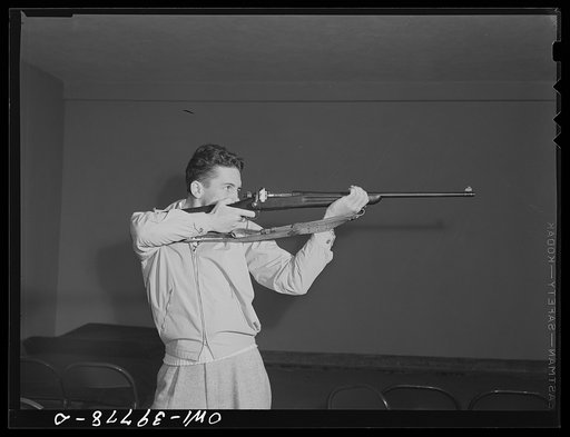 Washington, D.C. Walter Spangenberg, a member of the Woodrow Wilson High School rifle club, is working on shooting from a standing position