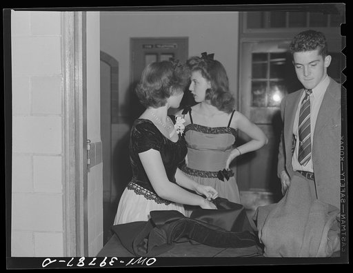 Washington, D.C. Students waiting for their coats to be checked at the regimental ball at Woodrow Wilson High School