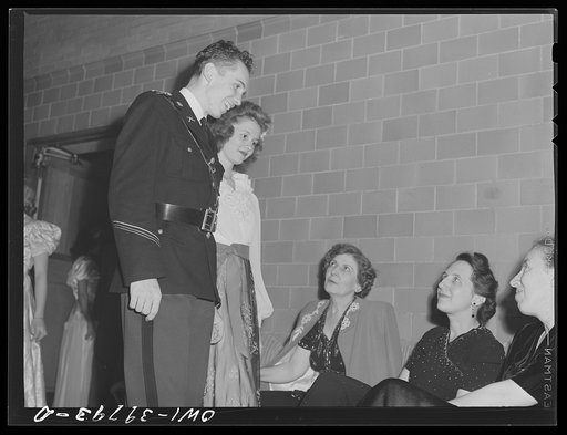 Washington, D.C. Walter Spangenberg and his date greeting the faculty chaperones at the regimental ball held at Woodrow Wilson High School