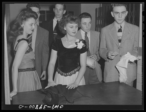 Washington, D.C. Students waiting for their coats to be checked at the regimental ball at Woodrow Wilson High School