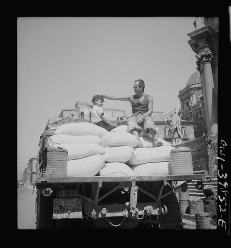 Messina, Sicily. Truckload of American white flour received via Italian schooner to help relieve the shortage here