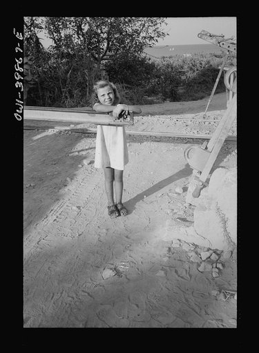 Small Sicilian girl, sister of the girl who tends the gates at the railroad crossing