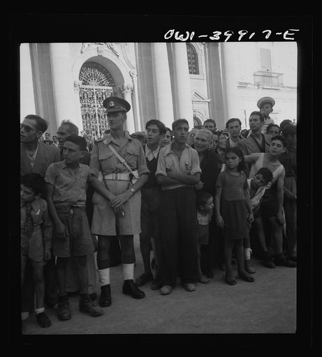 Sicilians waiting in line outside a re-opened bank