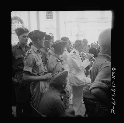 Palermo, Sicily. Allied soldiers listening to concert given for them by Palermo symphony orchestra and local vocal artists