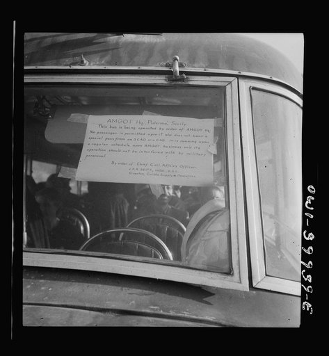 A Sicilian bus with Allied military government permit shown on windshield