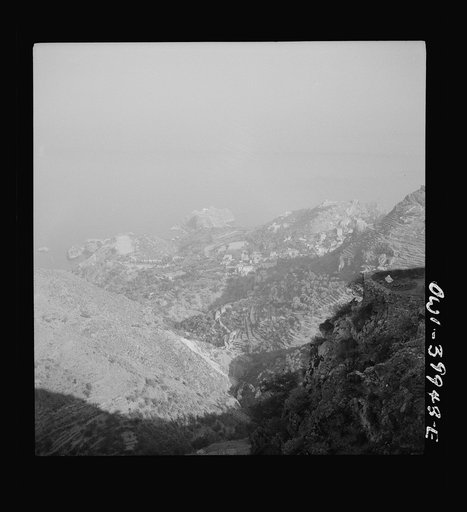 Castel Mola (vicinity), Sicily. A mountain and sea view to be seen from the castle. One of the peacetime attractions visited by the British Eighth Army on their day off