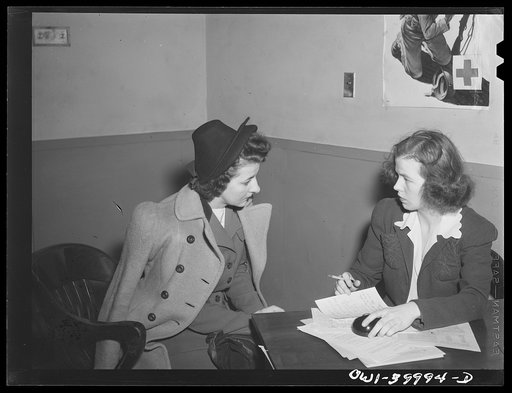 Untitled photo, possibly related to: Washington, D.C. The registration desk during a drive for blood donors sponsored by Local 203 of the United Federal Workers of America, Congress of Industrial Organizations (CIO), and the personnel division of the United States Office of War Information (OWI)