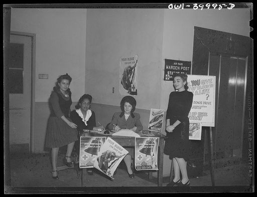 Washington, D.C. The registration desk during a drive for blood donors sponsored by Local 203 of the United Federal Workers of America, Congress of Industrial Organizations (CIO), and the personnel division of the United States Office of War Information (OWI)