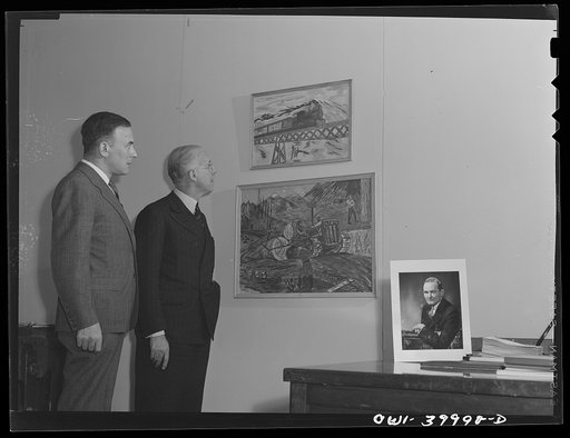 Washington, D.C. Ferdinand Kuhn of the United States Office of War Information and George Alexander Armstrong of the United States Consulate at Manchester, England