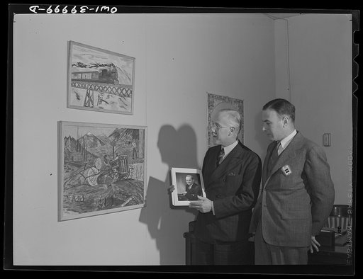 Washington, D.C. Ferdinand Kuhn of the United States Office of War Information and George Alexander Armstrong of the United States Consulate at Manchester, England