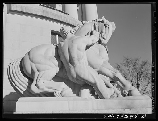 Untitled photo, possibly related to: Washington, D.C. A statue in front of the Federal Trade Commission building