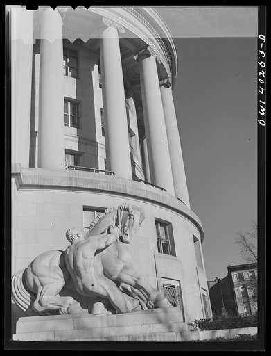Untitled photo, possibly related to: Washington, D.C. A statue in front of the Federal Trade Commission building