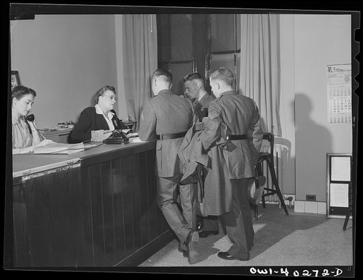 Washington, D.C. At the information desk for enlisted men in the United Nations service center
