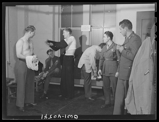 Washington, D.C. Without engaging a hotel room, traveling servicemen may take a shower, shave, and wash and iron clothes at the United Nations service center