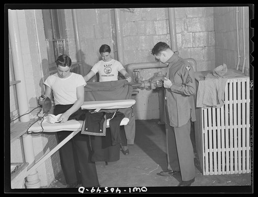 Washington, D.C. Servicemen using the laundry facilities in the sub-basement of the United Nations service center. It is not necessary to engage a hotel room in order to use these accommodations