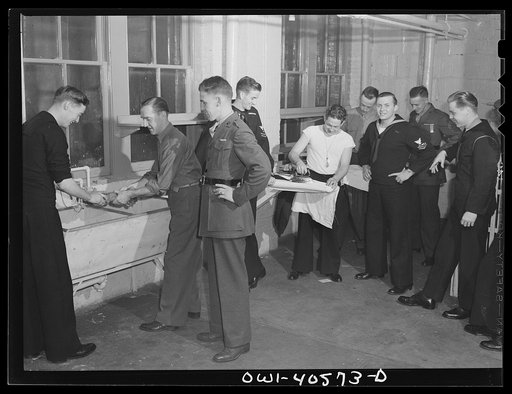 Washington, D.C. Servicemen using and inspecting the laundry facilities at the United Nations service center