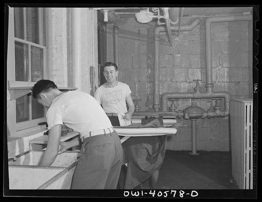 Washington, D.C. Servicemen using the laundry facilities in the sub-basement of the United Nations service center. It is not necessary to engage a hotel room in order to use these accomodations