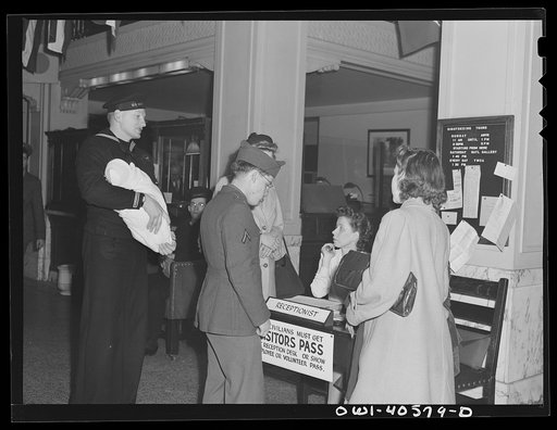 Washington, D.C. Hugh and Lynn Massman at the United Nations service center. Just arrived in Washington, they are told they can leave their baby in the nursery while they see the town and find a place to live