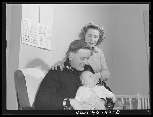 Washington, D.C. Hugh and Lynn Massman with their son Joey in the nursery at the United Nations service center